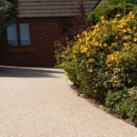Resin driveway with foliage