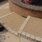 resin steps with light brick surrounding